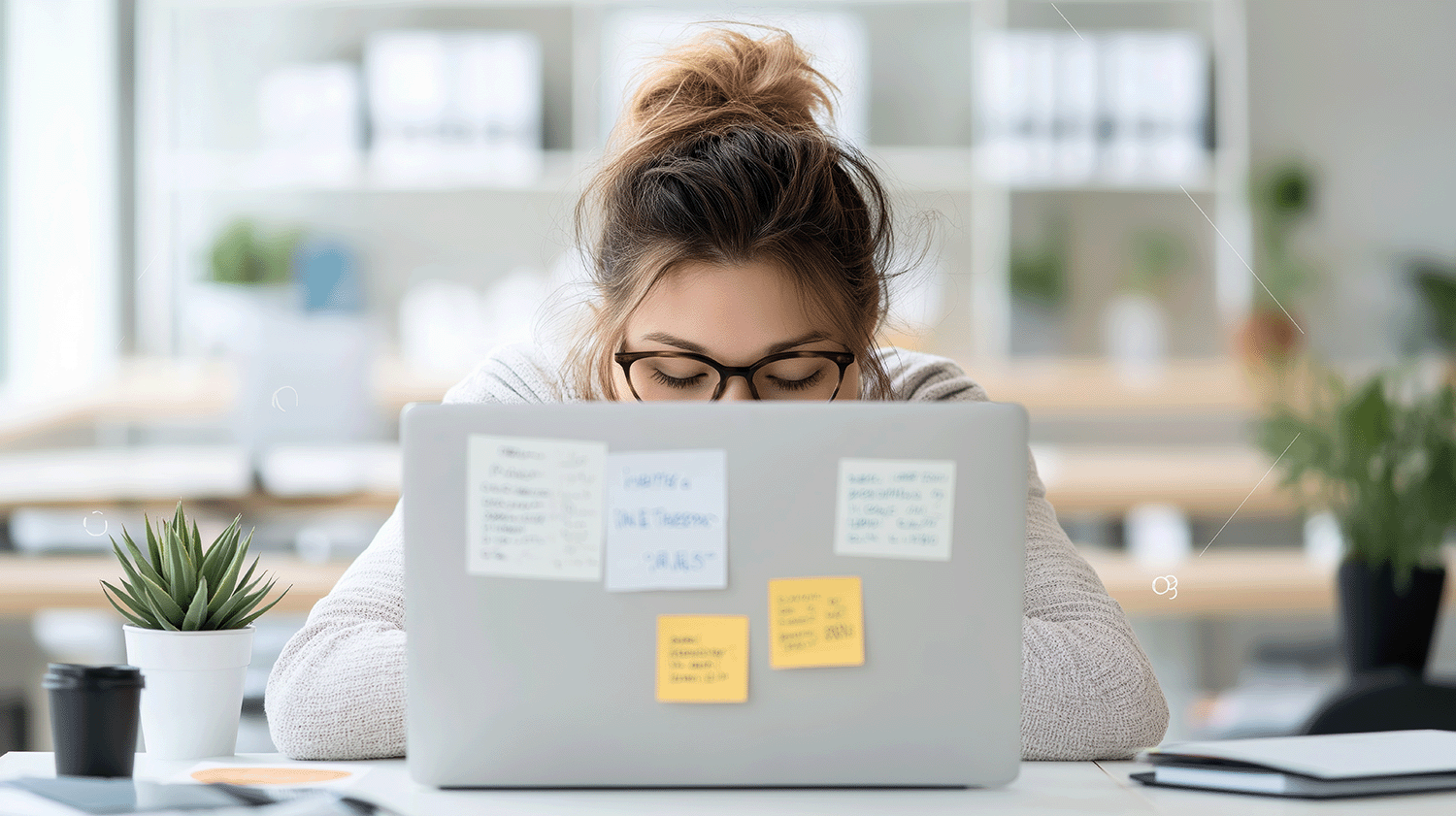 laptop with notes in front of female 1126916236