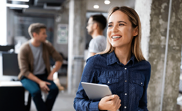 happy business woman with ipad in office-1